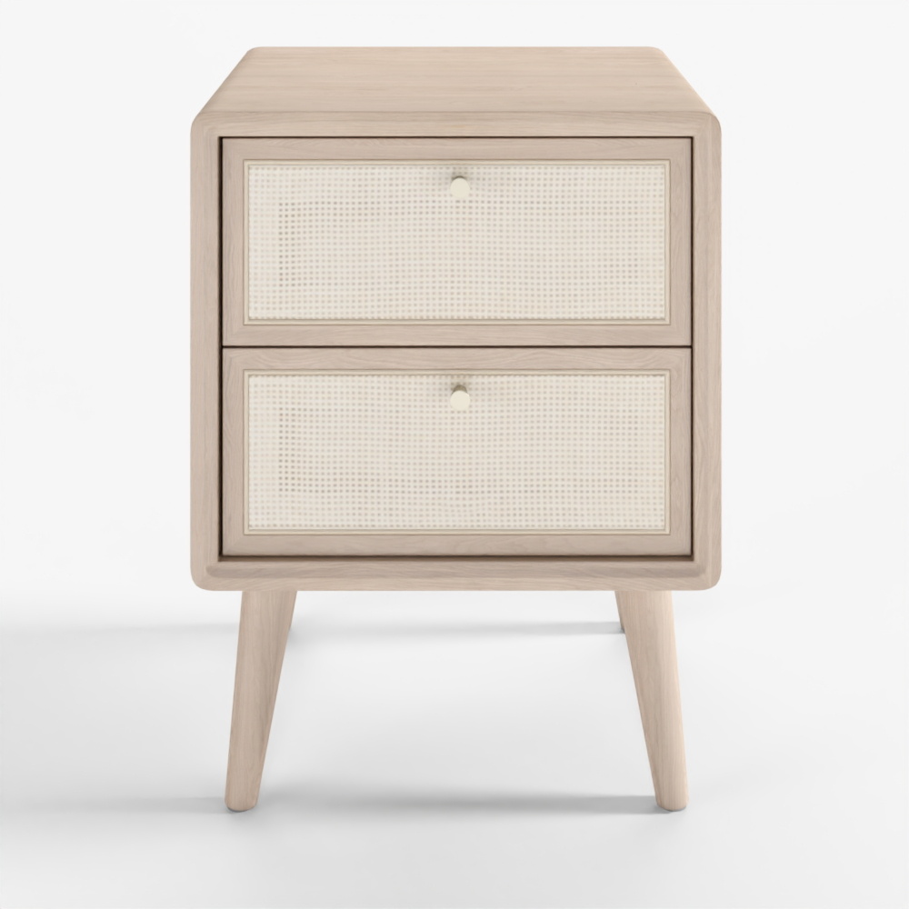 Modern light wood nightstand with cane drawers and gold knobs on grey background