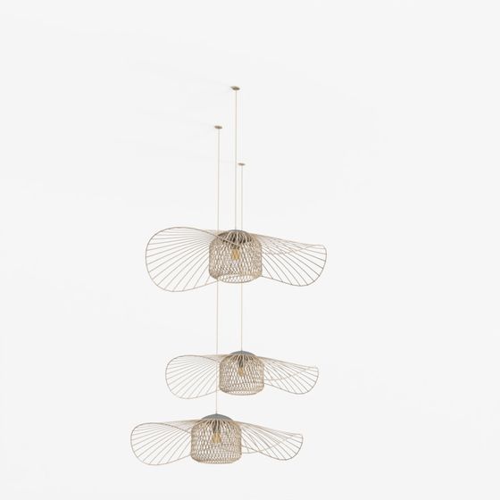 Three gold wire pendant ceiling lights with wing shapes on grey background